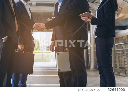 Action of business people meeting agreement Action of business people meeting agreement 32641900