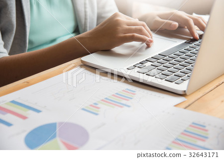 Business woman hands using laptop for her work. 32643171