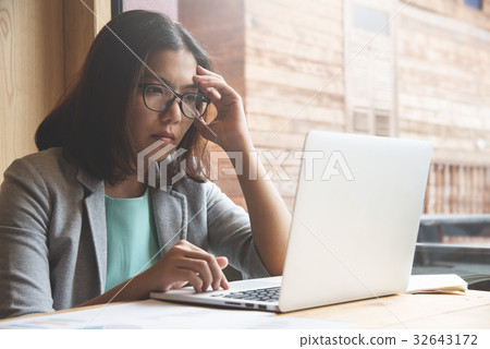 Asian Business woman thinking. Asian Business woman thinking. 32643172