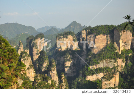 Quartz sandstone pillar in Zhangjiajie in China Quartz sandstone pillar in Zhangjiajie in China 32643423