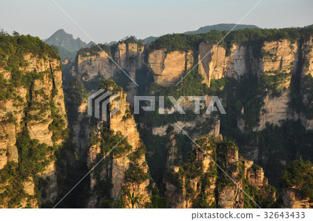 Quartz sandstone pillar in Zhangjiajie in China Quartz sandstone pillar in Zhangjiajie in China 32643433
