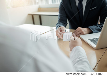 young businessman at the hiring interview in the office, meeting young businessman at the hiring interview in the office, meeting 32644079