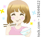 A woman eating rice 32644622