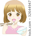 A woman eating rice 32644947