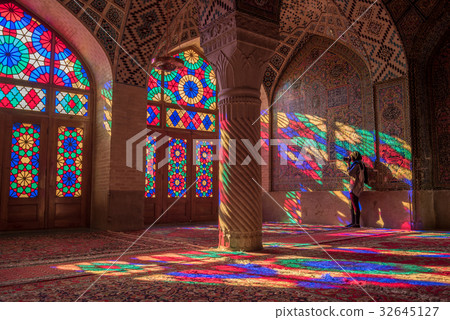 woman in Nasir Al-Mulk Mosque in Shiraz, Iran 32645127