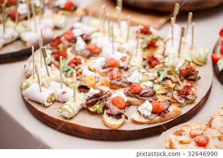Assorted canape with cheese, meat, rolls, bakery 32646990