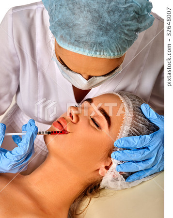 Dermal fillers of woman in spa salon with Dermal fillers of woman in spa salon with 32648007