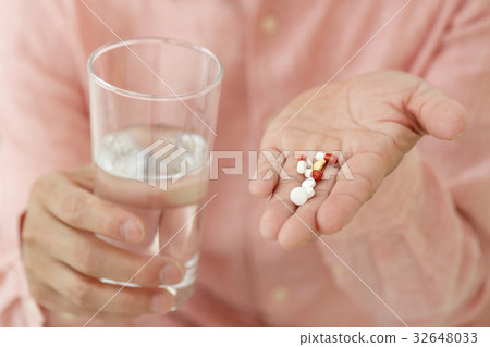 Person who takes medicine Parts cut 32648033