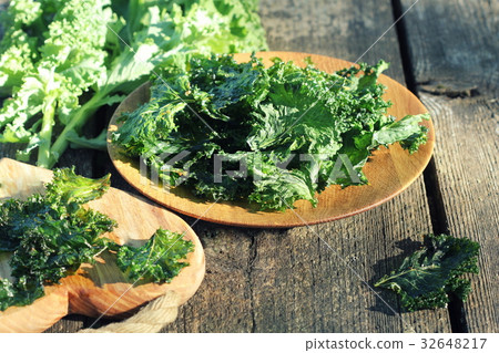 Homemade Organic Green Kale Chips with salt and 32648217