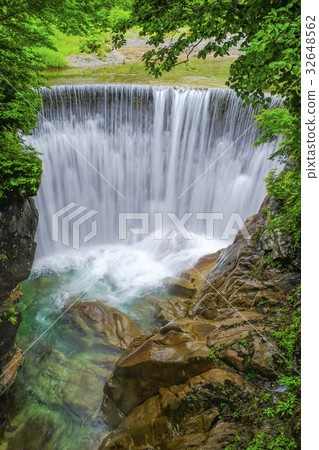 Fresh green hot water falls (vertical) 32648562