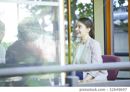 A woman enjoying tea time A woman enjoying tea time 32649697