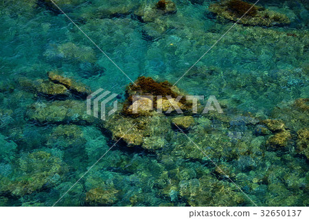 Background of turquoise sea with rocks Background of turquoise sea with rocks 32650137