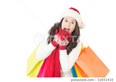 woman Christmas gift surprised and happy hand woman Christmas gift surprised and happy hand 32651410
