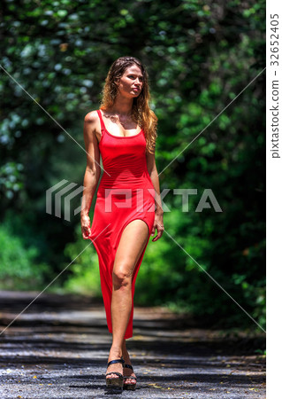 Young Woman Walking on The Tropical Road 32652405