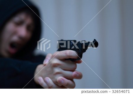 Pistol handgun (criminal illegal culprit villain disguise casualty case criminal suspicious intruder gang) 32654071
