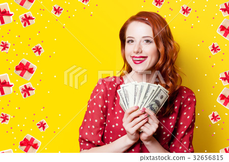 girl in red dress with money 32656815