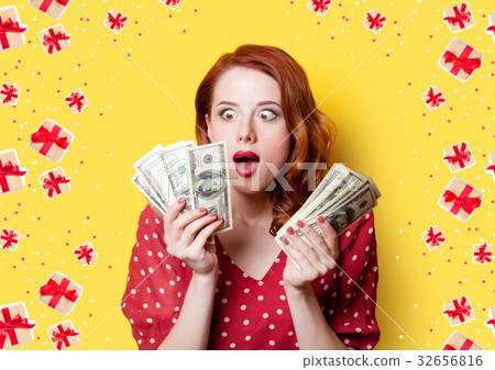 girl in red dress with money 32656816