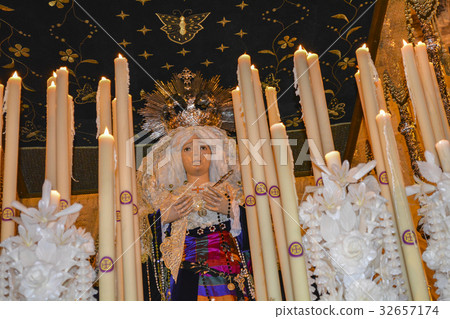 Holy week procession in Spain, Andalusia. 32657174