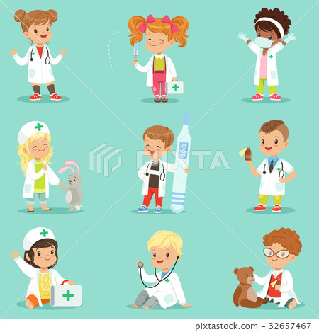 Adorable kids playing doctor set. Smiling little Adorable kids playing doctor set. Smiling little 32657467