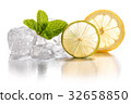 Ice cubes, lime and lemon. 32658850