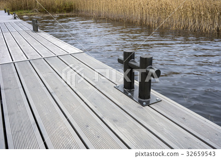 jetty for boats on the lake jetty for boats on the lake 32659543