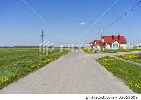 road near the village houses and fields road near the village houses and fields 32659609