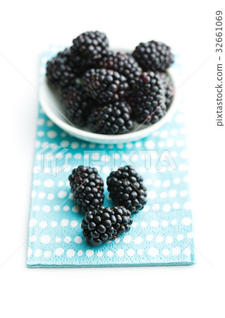 Tasty ripe blackberries in bowl. Tasty ripe blackberries in bowl. 32661069