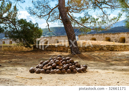 Old cannonballs in Fortezza Castle Rethymno, Crete Old cannonballs in Fortezza Castle Rethymno, Crete 32661171