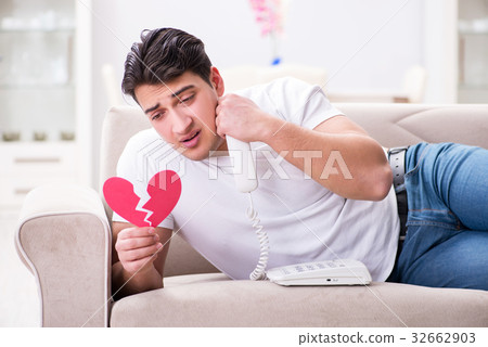 Young man in sad saint valentine concept 32662903