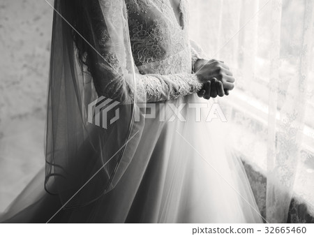Attractive Beautiful Bride in a Wedding White Dress 32665460