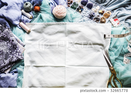 Garment and textile with sewing equipment Garment and textile with sewing equipment 32665778