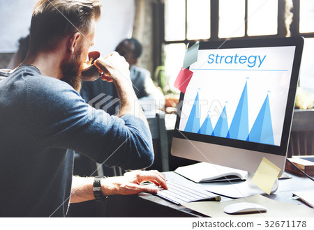 Man working on computer network graphic overlay 32671178