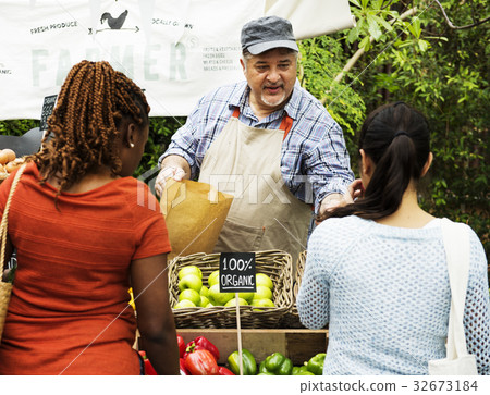 Man owner fresh grocery organic shop Man owner fresh grocery organic shop 32673184