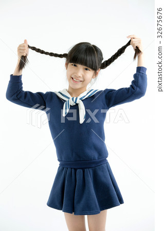 Happy little Asian child smiling and dancing Happy little Asian child smiling and dancing 32675676