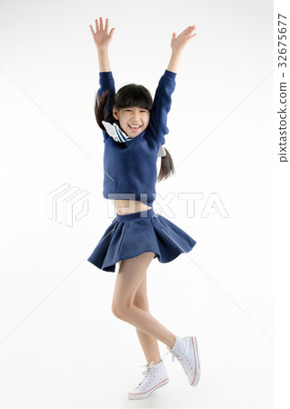 Happy little Asian child smiling and dancing Happy little Asian child smiling and dancing 32675677