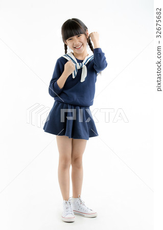 Happy little Asian child smiling and dancing Happy little Asian child smiling and dancing 32675682