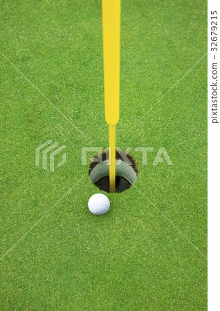 Cup and golf ball Cup and golf ball 32679215