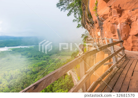 Wooden bridge, balcony at mountain side, the women 32681570