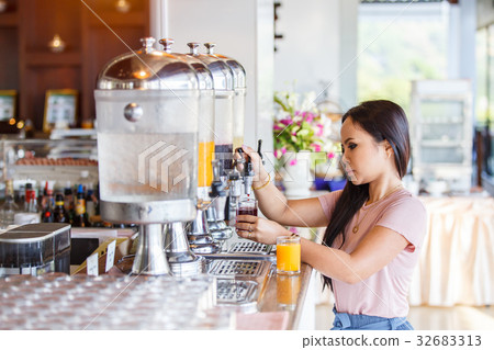 Juice buffet self service in morning at hotel. Juice buffet self service in morning at hotel. 32683313
