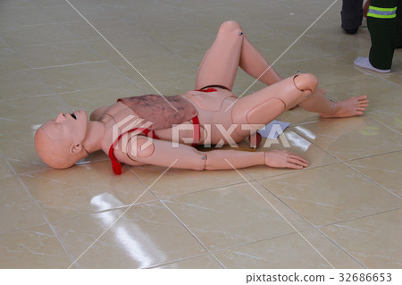 medical dummy receiving CPR refresher training medical dummy receiving CPR refresher training 32686653