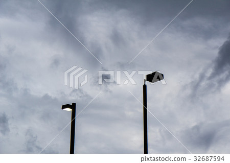 Fayetteville streetlight and cloudy sky 32687594