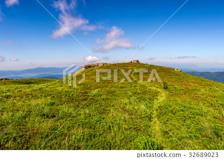 footpath through the mountain ridge 32689023