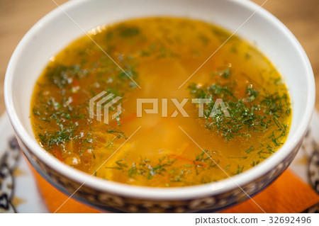 Chicken soup with noodles 32692496