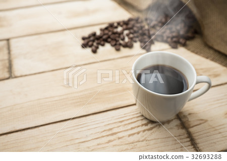 Hot coffee and coffee beans Hot coffee and coffee beans 32693288