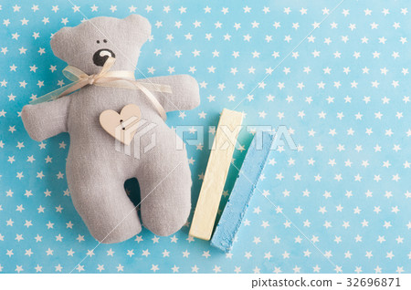 Blue white stars background with teddy bear Blue white stars background with teddy bear 32696871
