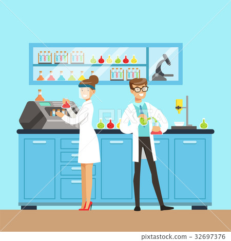 Chemists male and female testing chemical elements 32697376