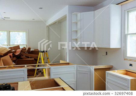 Custom kitchen cabinets of installation 32697408