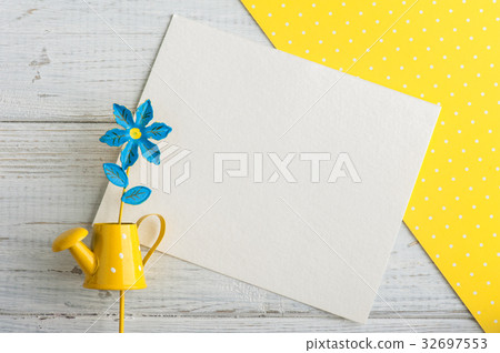 Yellow polka dot desk, note and watering can Yellow polka dot desk, note and watering can 32697553