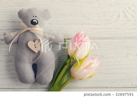 Teddy Bear with pink tulips Teddy Bear with pink tulips 32697591