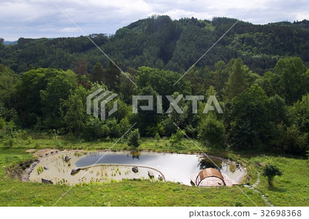 Wooden pier at natural swimming pond Wooden pier at natural swimming pond 32698368